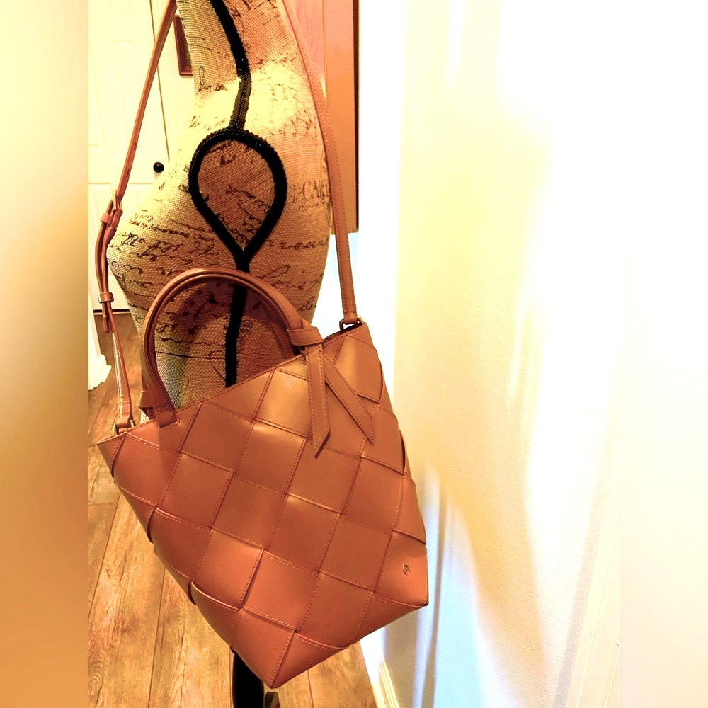 Etienne Aigner Italy shoulder bucket bag in tan luggage leather.